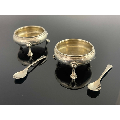 30 - A pair of George III silver salts, John Muns, London 1767, on hoof feet, associated silver plated sp... 