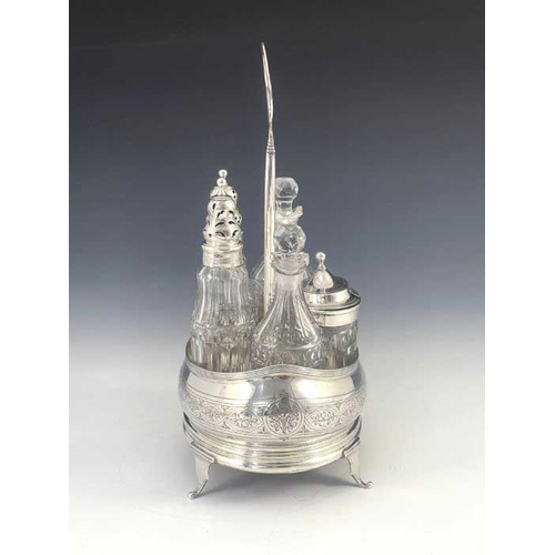 32 - A George III silver cruet and stand, Alexander Field, London 1802, bombe oval form, with bright cut ... 