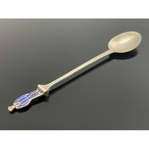 37 - Liberty and Co., an enamelled silver figural tea spoon, Birmingham 1915, for the Injured Veterans Fu... 