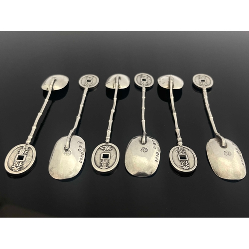 3A - A set of six Chinese silver teaspoons, script marks to the bowls, simulated bamboo handles, pierced ... 