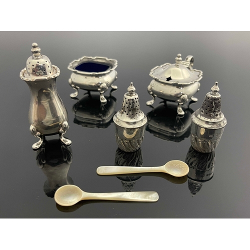 59 - A George VI silver three piece cruet together with a pair of Victorian pepper pots, William Suckling... 