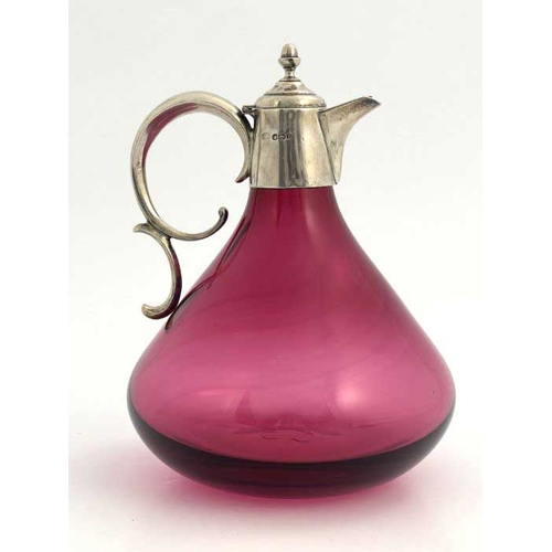 61A - A Victorian silver mounted ruby glass claret jug, John Round & Son, Sheffield 1897, squat form with ... 