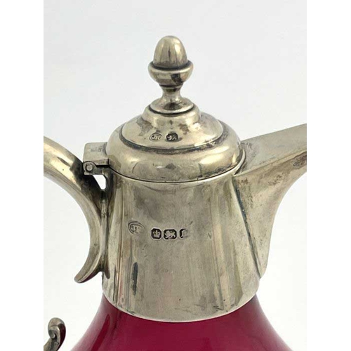 61A - A Victorian silver mounted ruby glass claret jug, John Round & Son, Sheffield 1897, squat form with ... 