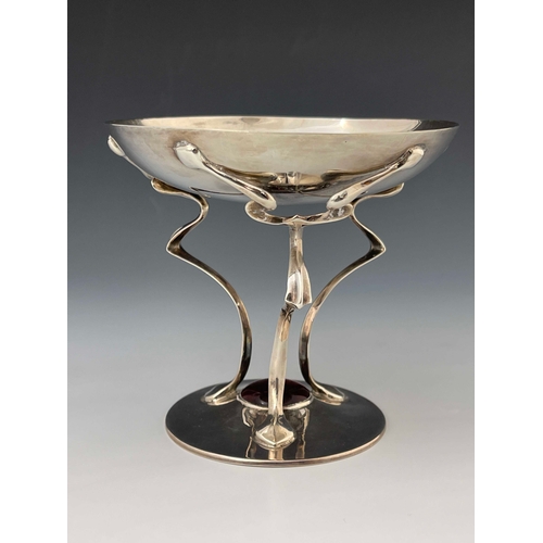 70 - An Arts and Crafts silver pedestal dish, John Round, Sheffield 1904, the shallow bowl on three whipl... 