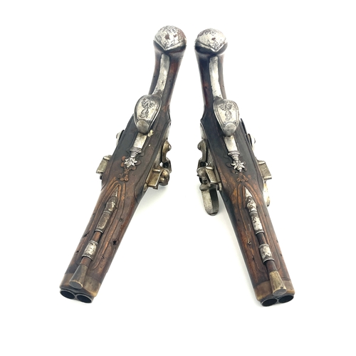 210 - A pair of late 18th century/early 19th century Continental flintlock double barrel pistols, 7 inch s... 