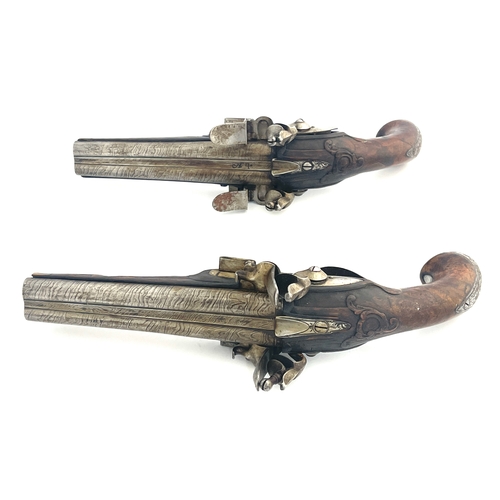 210 - A pair of late 18th century/early 19th century Continental flintlock double barrel pistols, 7 inch s... 