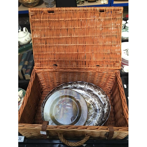 30 - A Fortnum & Mason wicker basket, containing series ware including Wedgwood Country Days, Palissy Gam... 