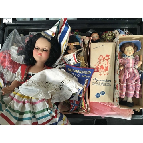 46 - A collection of 20th century dolls in various national costumes (20+)