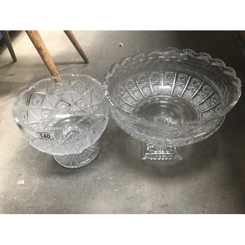 140 - A cut glass pedestal bowl, hobnail and star cut decoration and castellated rim, and another example,... 