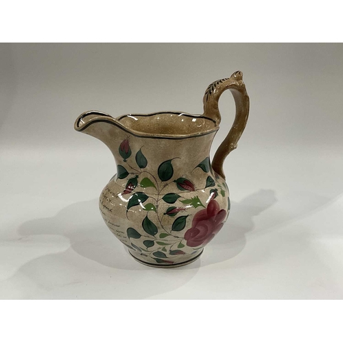 141D - A large 19th Century salt glazed stoneware pitcher, sprigged Prince of Wales heraldry and motifs and... 