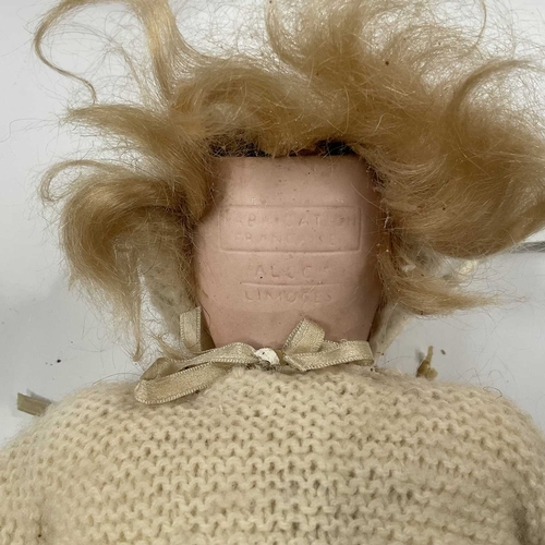 142E - An early 20th Century French bisque head doll, blonde wig, sleeping eyes, open mouth and pierced ear... 