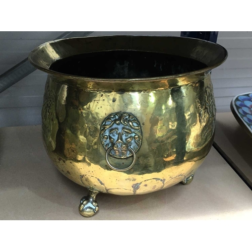 143 - A Regency brass wine cooler, cauldron shape, repousse vine decoration, lion mask and ring handles, t... 