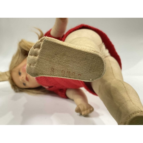 143A - A Kathe Kruse VEB Bad Kosen Kathe Kruse doll, moulded painted head with blond mohair wig,  face pain... 