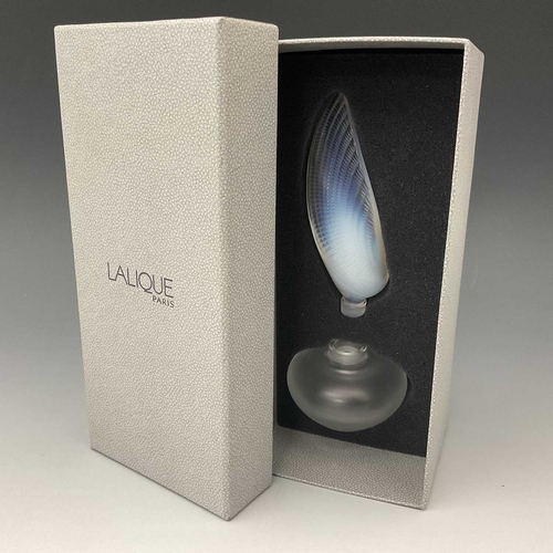 144C - Rene Lalique, Flacon Coquillage, ovoid glass scent bottle with opalescent glass stopper modelled as ... 