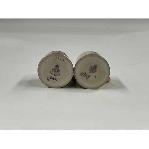 145E - Two Royal Worcester rose painted miniature mugs, circa 1920, cylindrical form with gilded scroll han... 