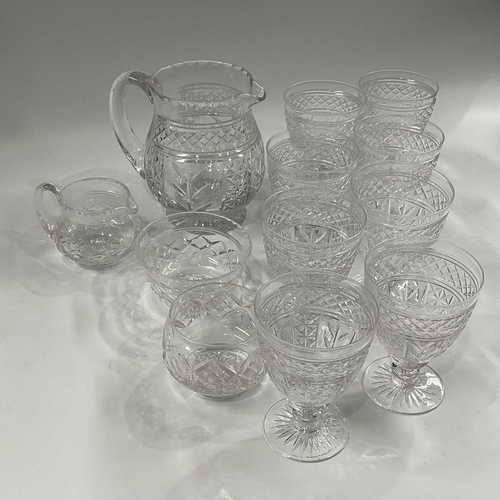 148D - A Tudor Crystal cut crystal water set, comprising jug and eight baluster stemmed drinking glasses, t... 