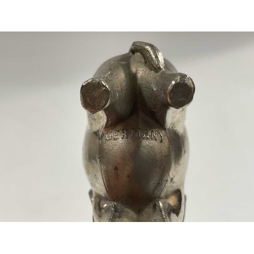 150A - A Cast metal pin cushion, modelled as a standing elephant, 4cm high, together with a James Dixon pew... 