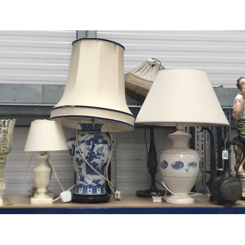 161 - A collection of light fittings, including blue and white Oriental lamp base, baluster form, panels d... 