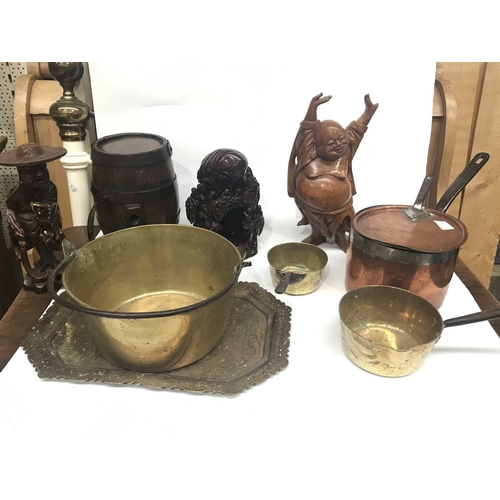 161F - A copper saucepan and lid, assorted brassware, a carved Chinese figure, two resing moulded figures, ... 