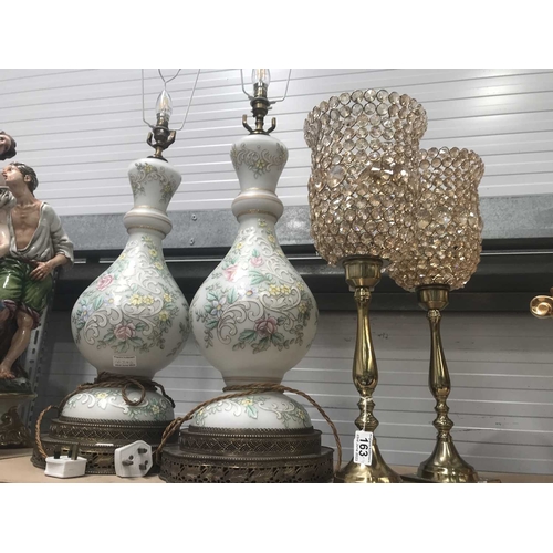 163 - A pair of enamelled glass baluster table lamps, 65cm high to fittings, together with a pair of brass... 