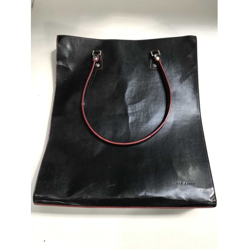 166 - A Ted Baker black leather tote bag with pipe red leather edging, 43cm high