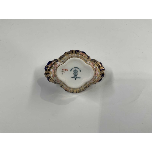 180A - A Royal Crown Derby Witches pattern miniature basket, crimped quarter lobed form, with cojoined loop... 