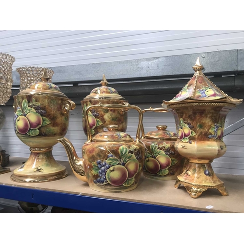 186 - A collection of fruit painted Baroness china vessels including a pair of large lidded urn vases and ... 