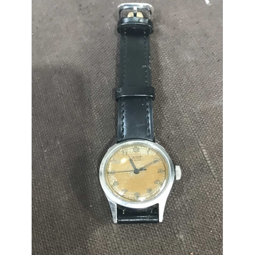 201 - Tissot, a stainless steel wristwatch 1940s, manual wind, on leather strap