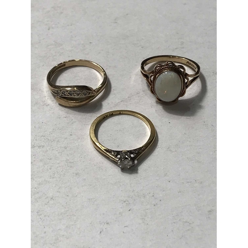 220 - Three gem-set rings, including a ring set in gold and platinum, and two 9ct gold rings, 5.98g (3)