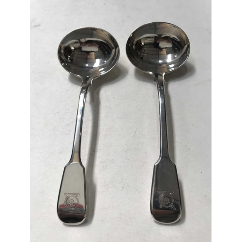 239 - A pair of George IV silver saucer ladles, Charles Eley, London 1826, Fiddle pattern, engraved shield... 