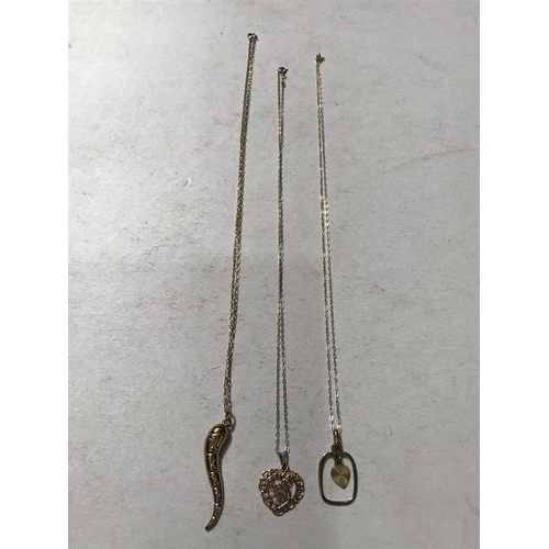 241 - Three 9ct gold or yellow metal necklaces, cable chain cable with two suspending heart pendants, 4.72... 