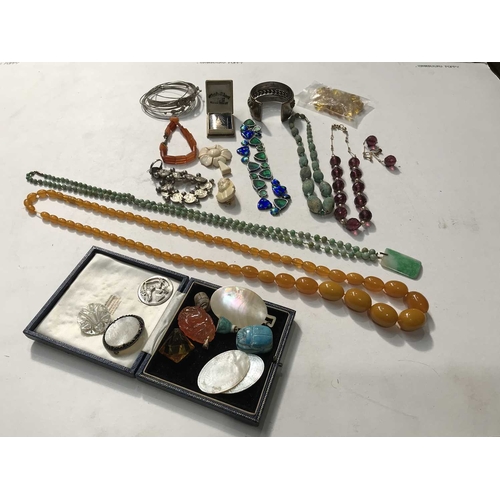 256 - A large selection of silver and costume jewellery, including necklaces, bracelets, mother of pearl c... 