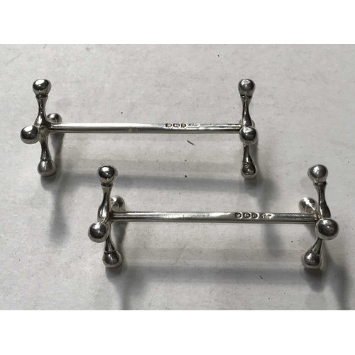 259 - A pair of Victorian silver knife rests, Martin, Hall & Co, Sheffield 1896, 2.12ozt (2)