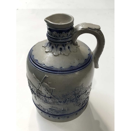 335 - Simon Peter Gerz, a late 19th century German blue and white salt glazed stoneware flagon, relief mou... 