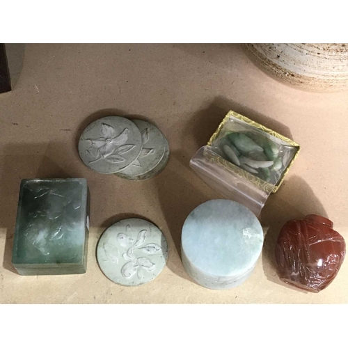 346 - A carved hardstone Chinese snuff bottle, a carved jadeite box and cover, three carved jade perching ... 