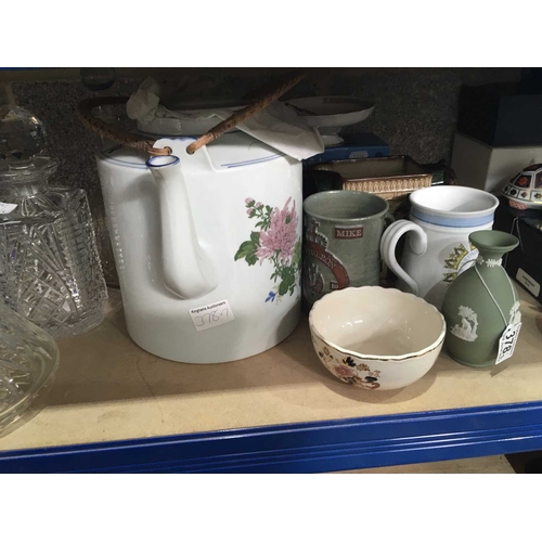 378 - A Royal Doulton Dickensware jug 'The Pickwick Papers', together with a pottery Royal Air Force tanka... 