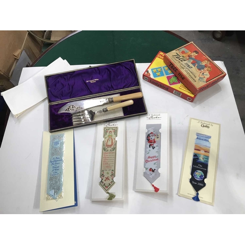 385 - A cased set of silver plated fish servers, two vintage children's games and four Cash's of Coventry ... 