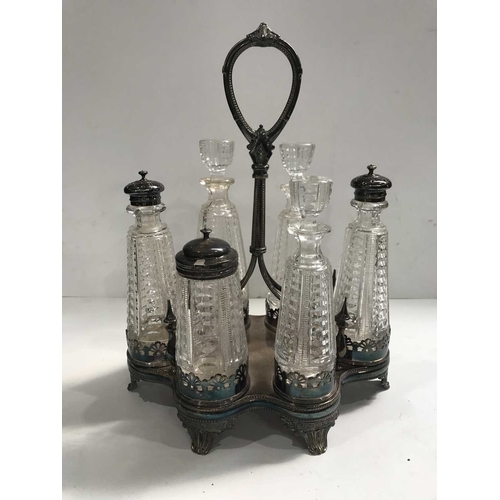 411 - An early Victorian silver plate and cut glass six piece cruet