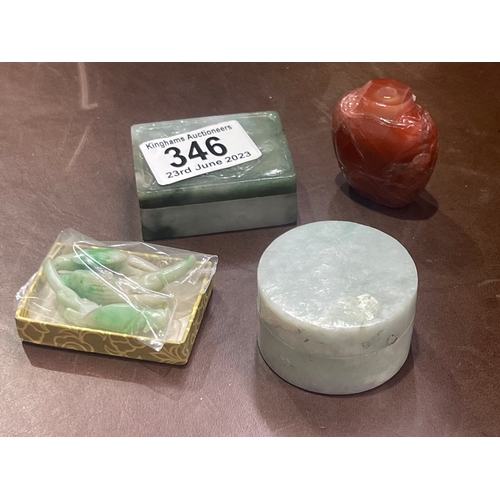 346 - A carved hardstone Chinese snuff bottle, a carved jadeite box and cover, three carved jade perching ... 