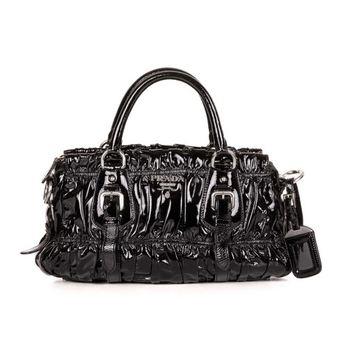 Prada a black patent leather Gaufre handbag featuring a gathered black patent leather exterior wit