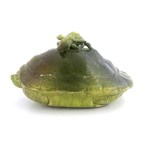 An art pottery turtle soup tureen, circa 1880, green faience glazed