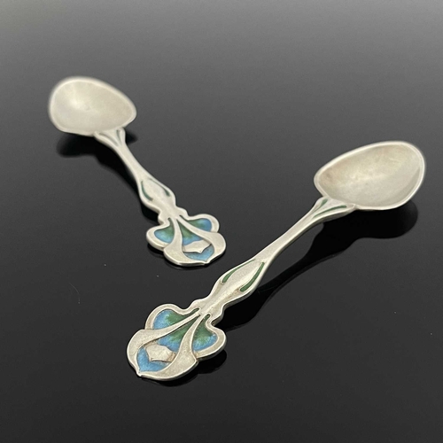 100 - Kate Harris for William Hutton, a pair of Arts and Crafts silver and enamelled tea spoons, London 19... 