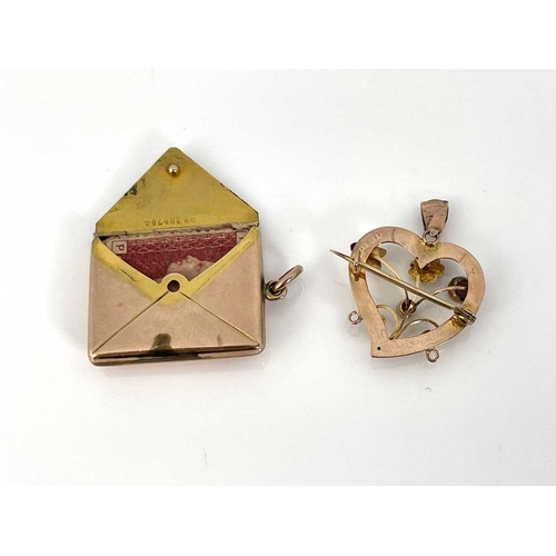 12 - A 9 carat gold combination envelope stamp case photo locket, together with a gem set heart shaped pe... 