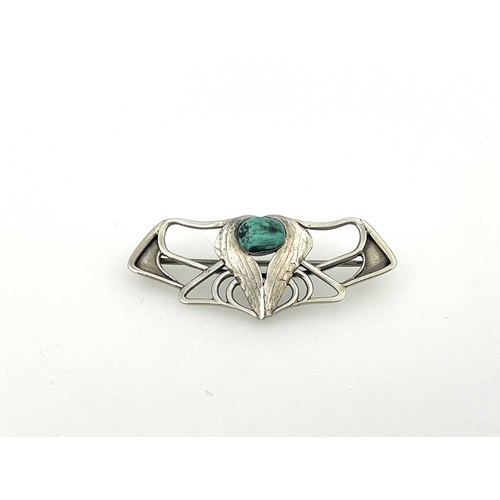 53 - Oliver Baker for Liberty and Co., a Cymric Arts and Crafts silver and turquoise brooch, open winged ... 