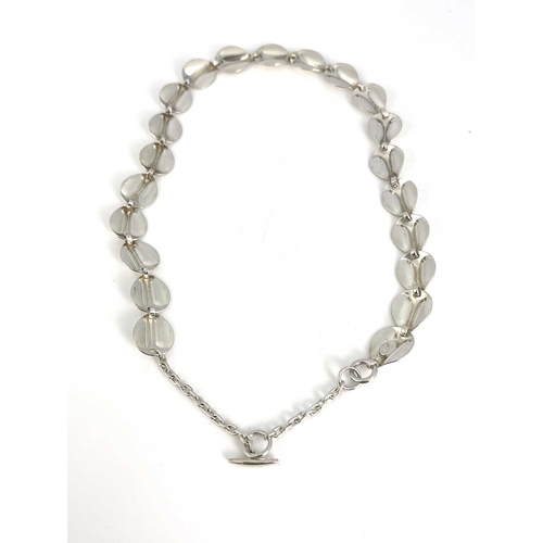 60 - A Modernist silver leaf design necklace, circa 1960s, interlinked stylised heart shaped leaves, 47cm... 