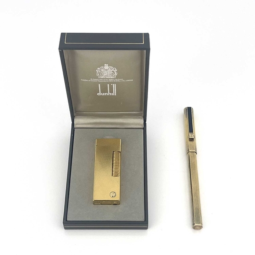 67 - Dunhill, a gold-plated lighter in the presentation box and a Dunhill gold-plated pen (2)