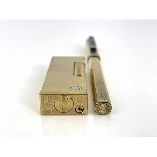 67 - Dunhill, a gold-plated lighter in the presentation box and a Dunhill gold-plated pen (2)