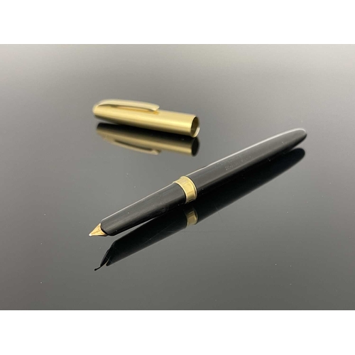 69 - Conway Stewart, a Conway 106 mark IV fountain pen, circ 1960s, gilt metal cap and black barrel with ... 