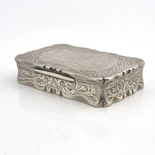 80 - A Victorian silver snuff box, Frederick Marson, Birmingham 1874, castle top form, chased foliate scr... 