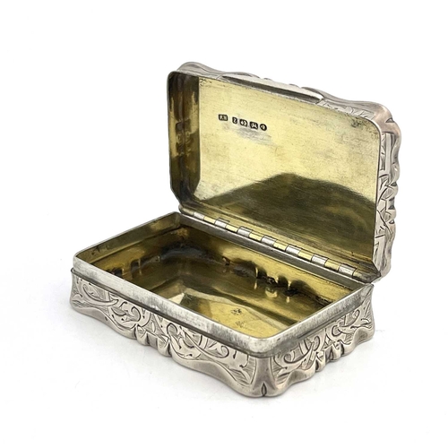 80 - A Victorian silver snuff box, Frederick Marson, Birmingham 1874, castle top form, chased foliate scr... 